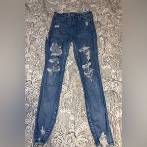 size 8 american eagle ripped blue high waisted skinny jeans